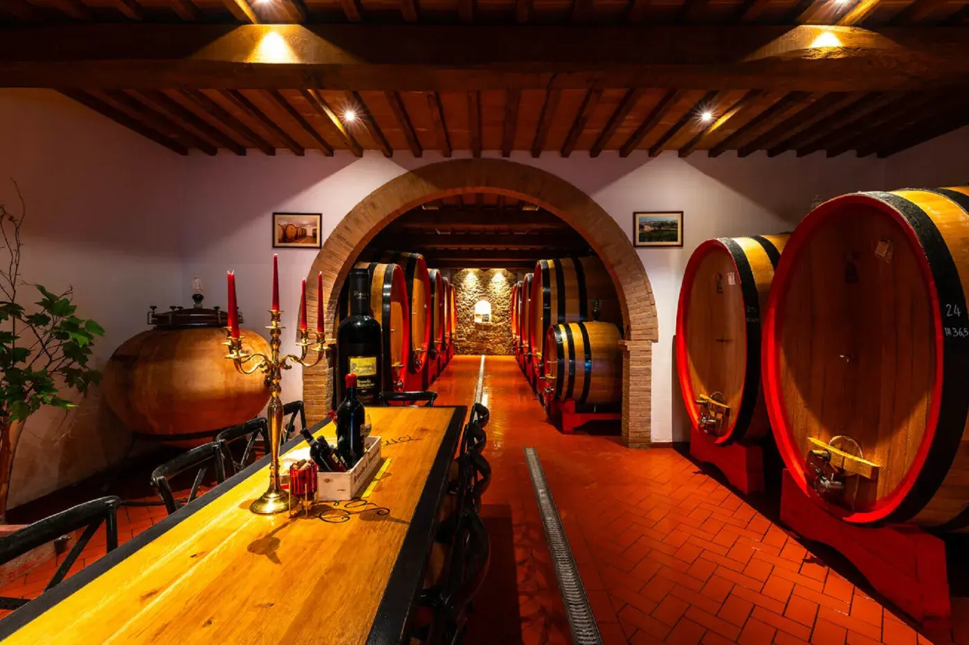 A wine cellar with oak barrels in Tuscany